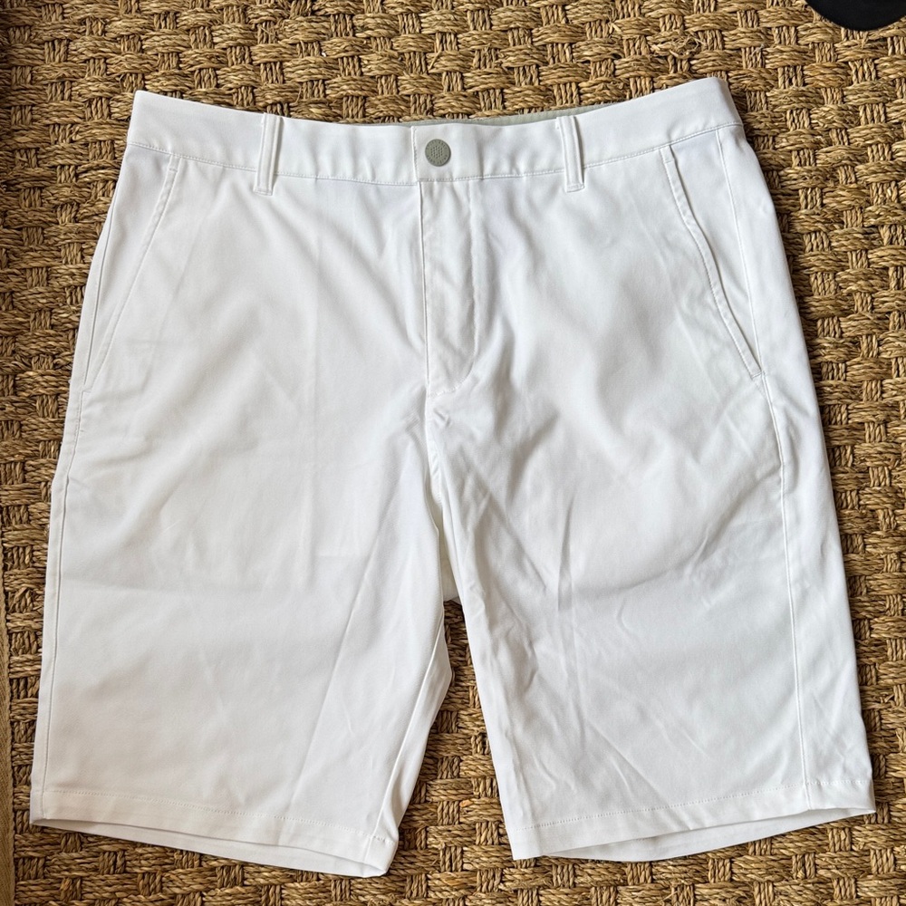 Puma  size 33Men's White Flat Front Shorts. Never been used.